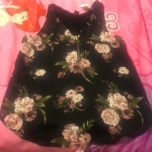 Rue 21 BNWT TANK TOP. Front is sheer material with flowers. Sz M